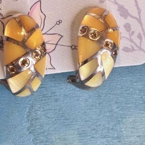 Sterling Silver earrings with citrine accents.